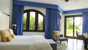 luxus schlafzimmer mit gartenblick im Cuisinart Resort & Spa resort anguilla karibik