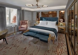 gemütliche superior suite im mandarin oriental luxushotel mit großem bett und warmer einrichtung